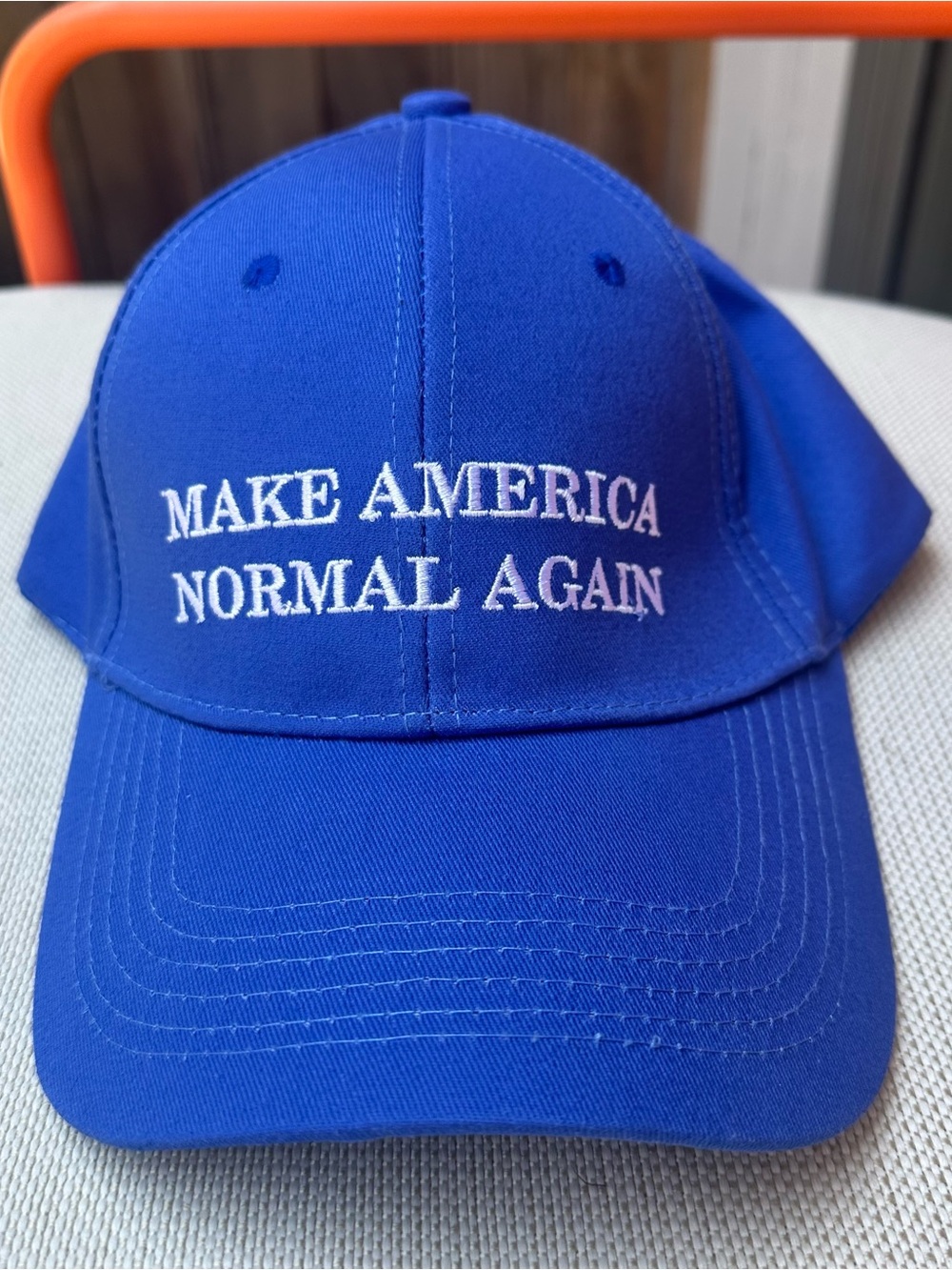 Blue Baseball Cap with "MAKE AMERICA NORMAL AGAIN" slogan